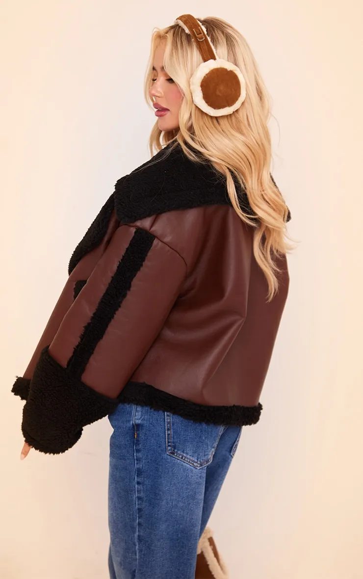Manteau  marron à bordure en imitation mouton noire