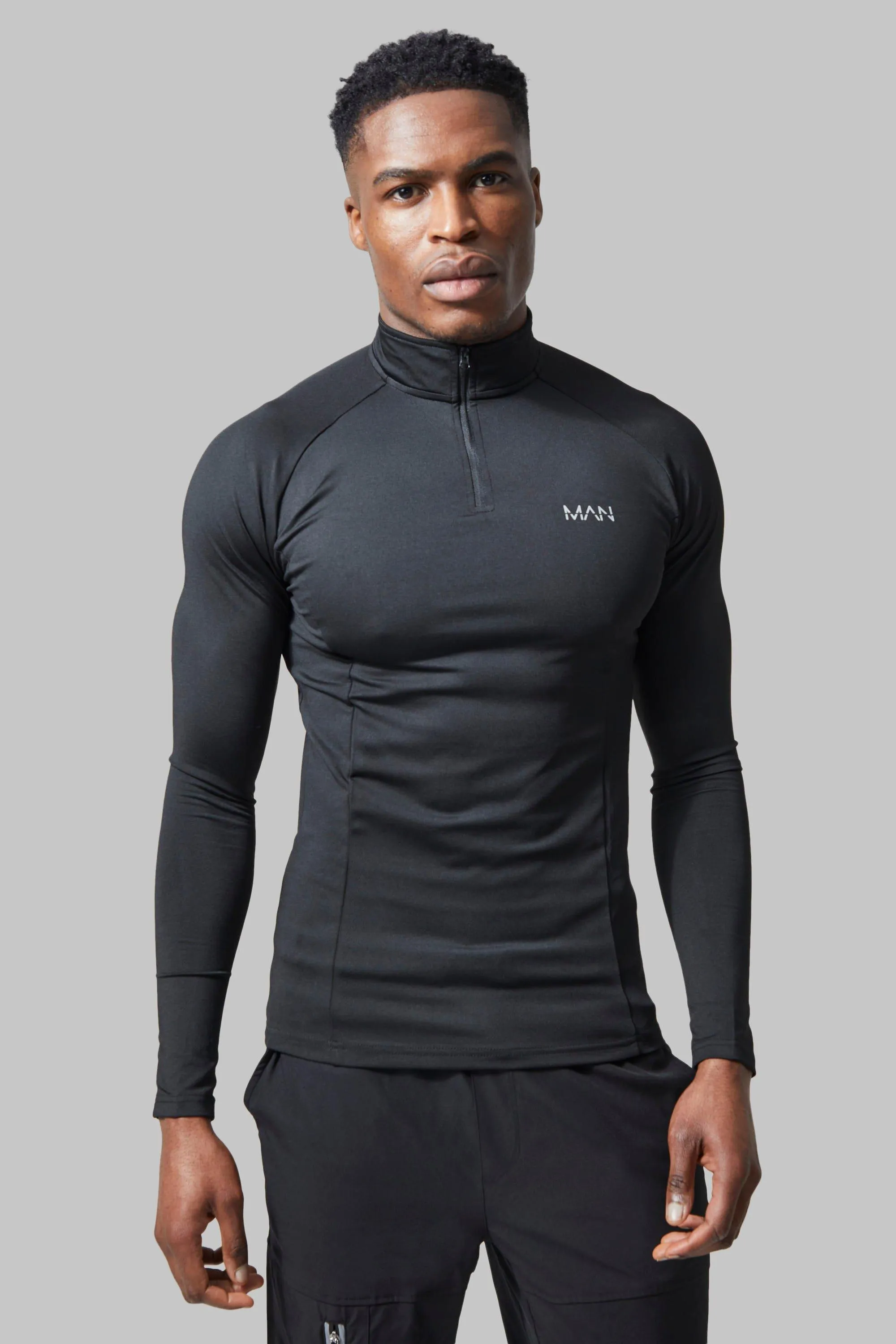 Top de sport à col zippé et manches raglan - MAN Active
